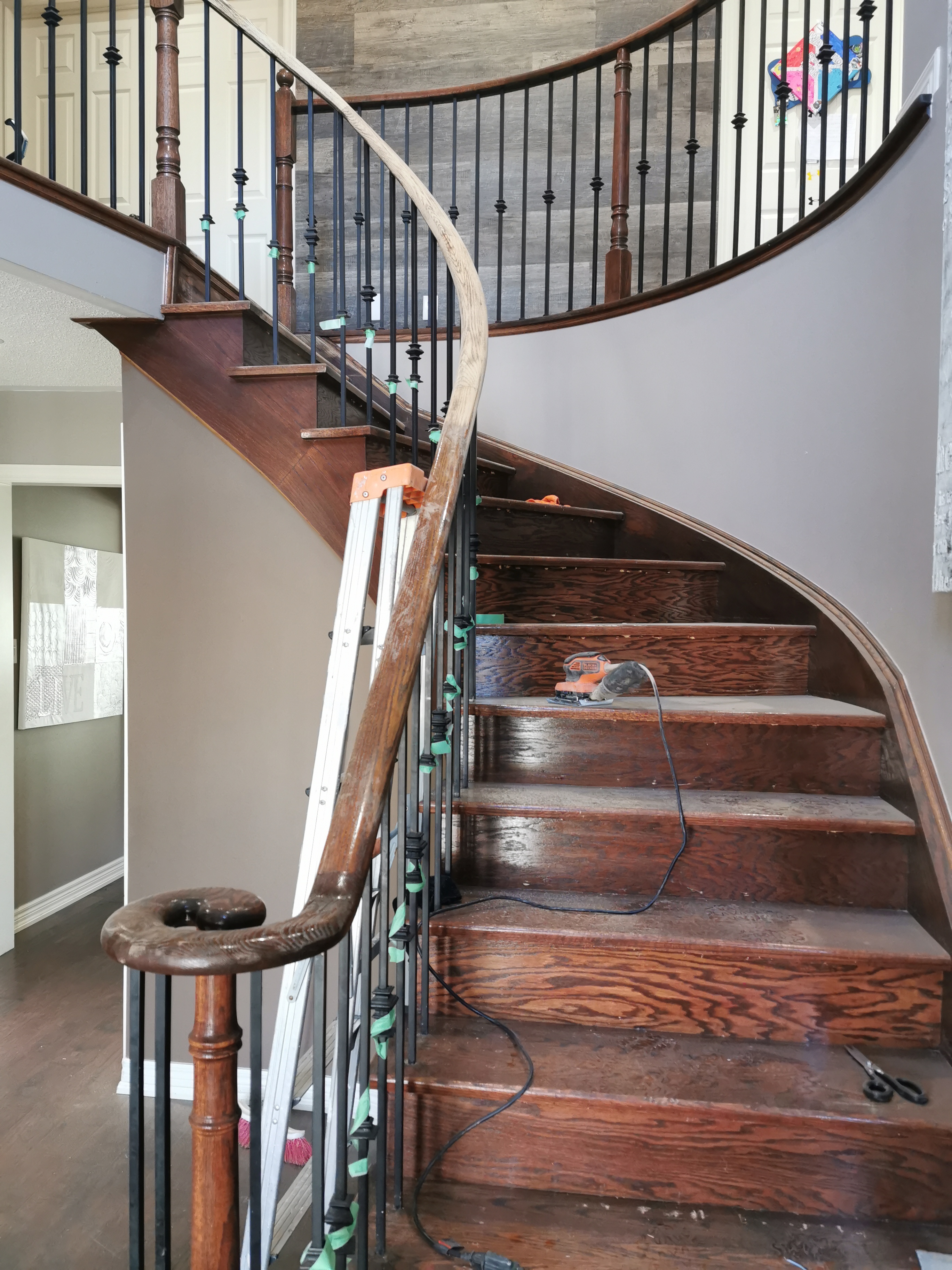 Here is an image of a flooring or stair renovation.