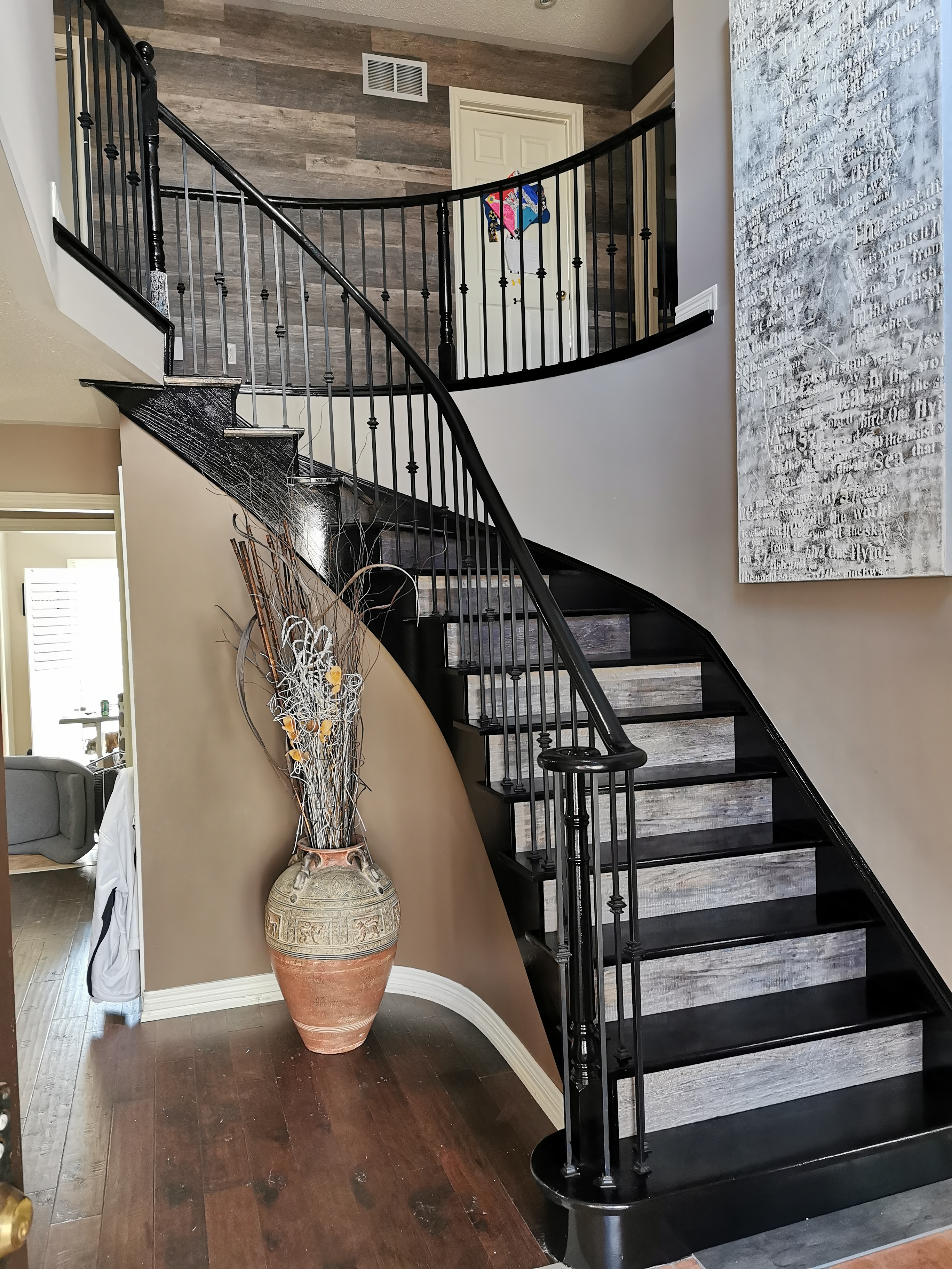 Here is an image of a flooring or stair renovation.
