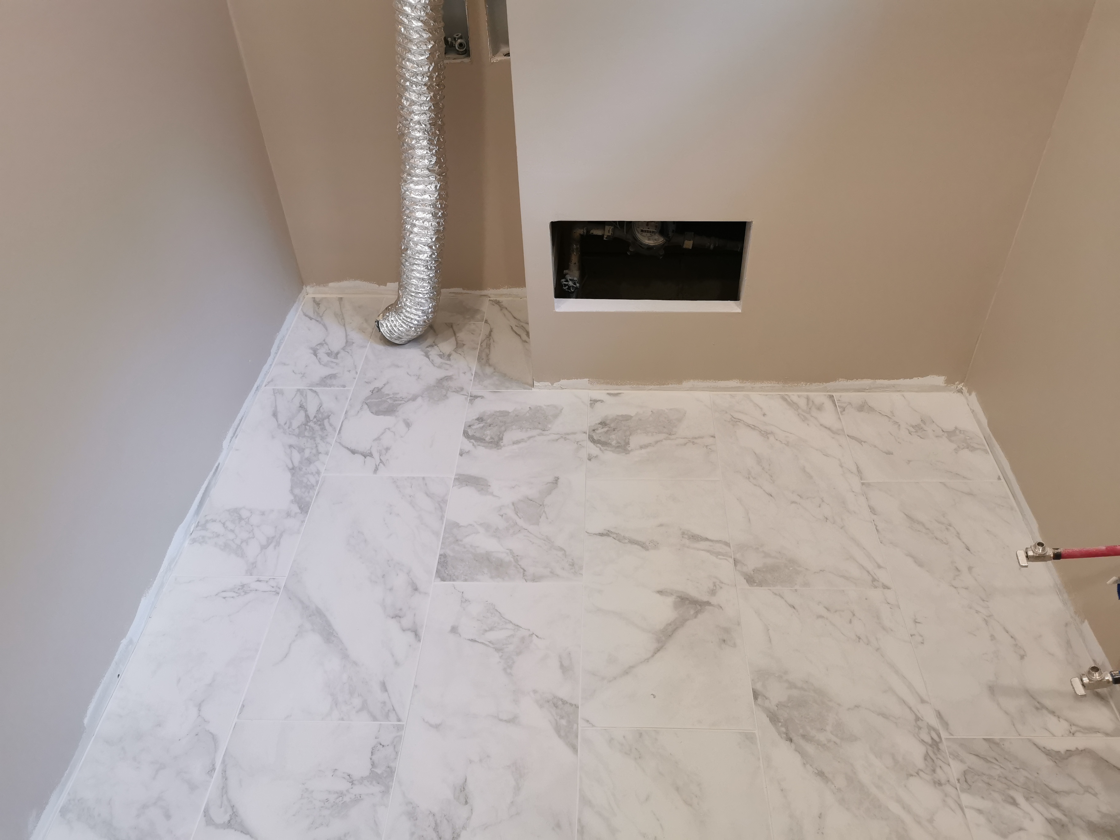 Here is an image of a flooring or stair renovation.